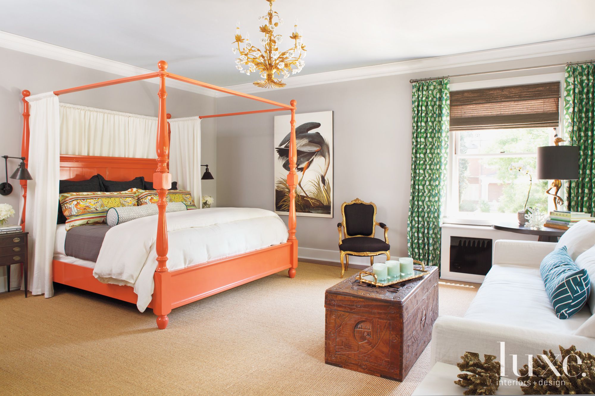 Master bedroom with orange bed - Luxe Interiors + Design