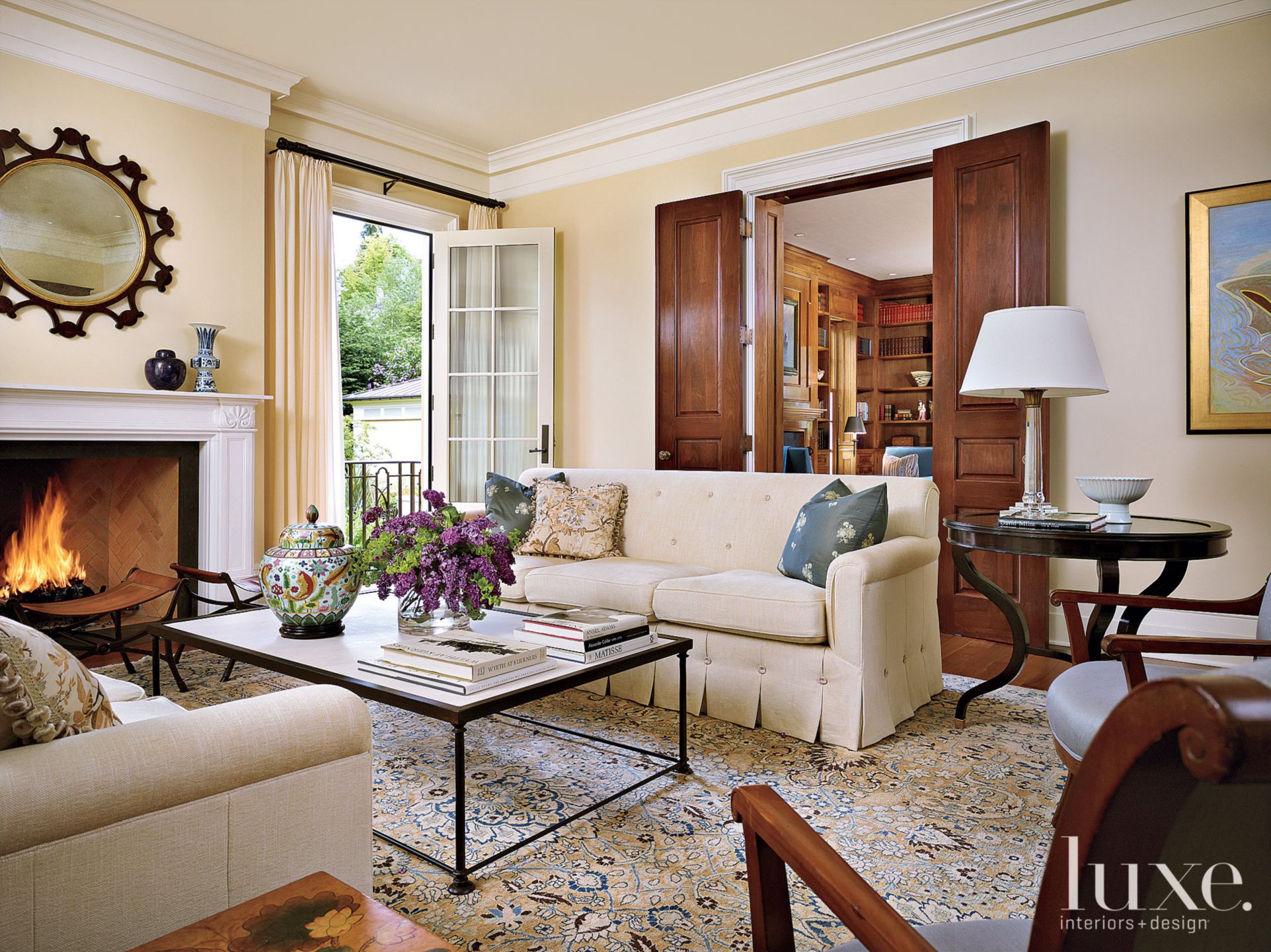 Traditional Cream Living Room with Custom Skirted Sofas | Luxe