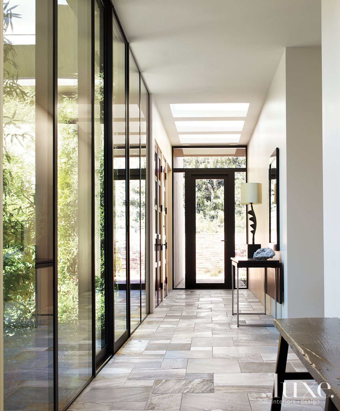 Neutral Limestone Hallway Luxe Interiors + Design