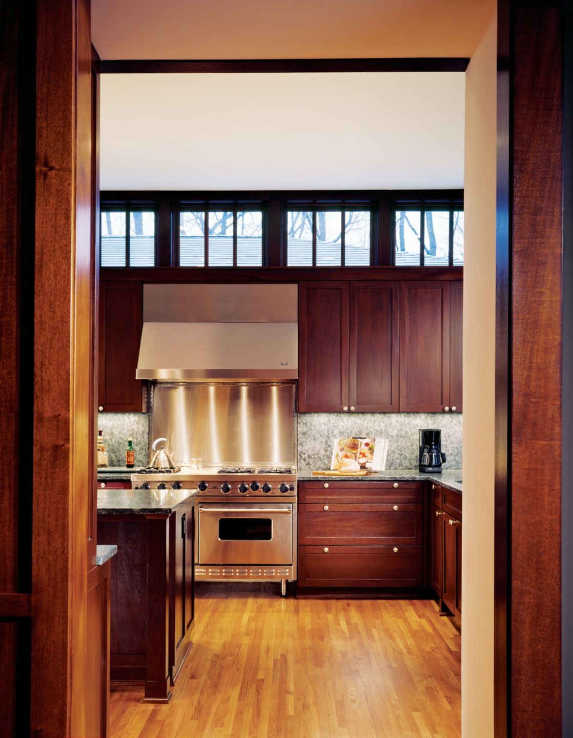 Contemporary Brown Kitchen - Luxe Interiors + Design