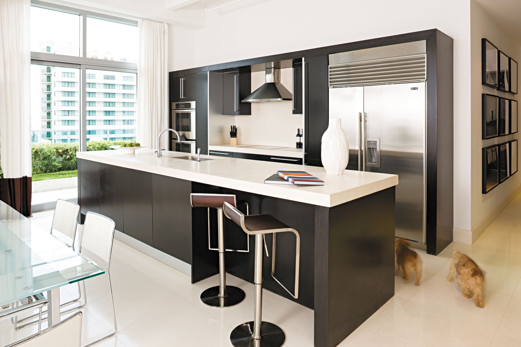 Modern White and Brown Kitchen - Luxe Interiors + Design