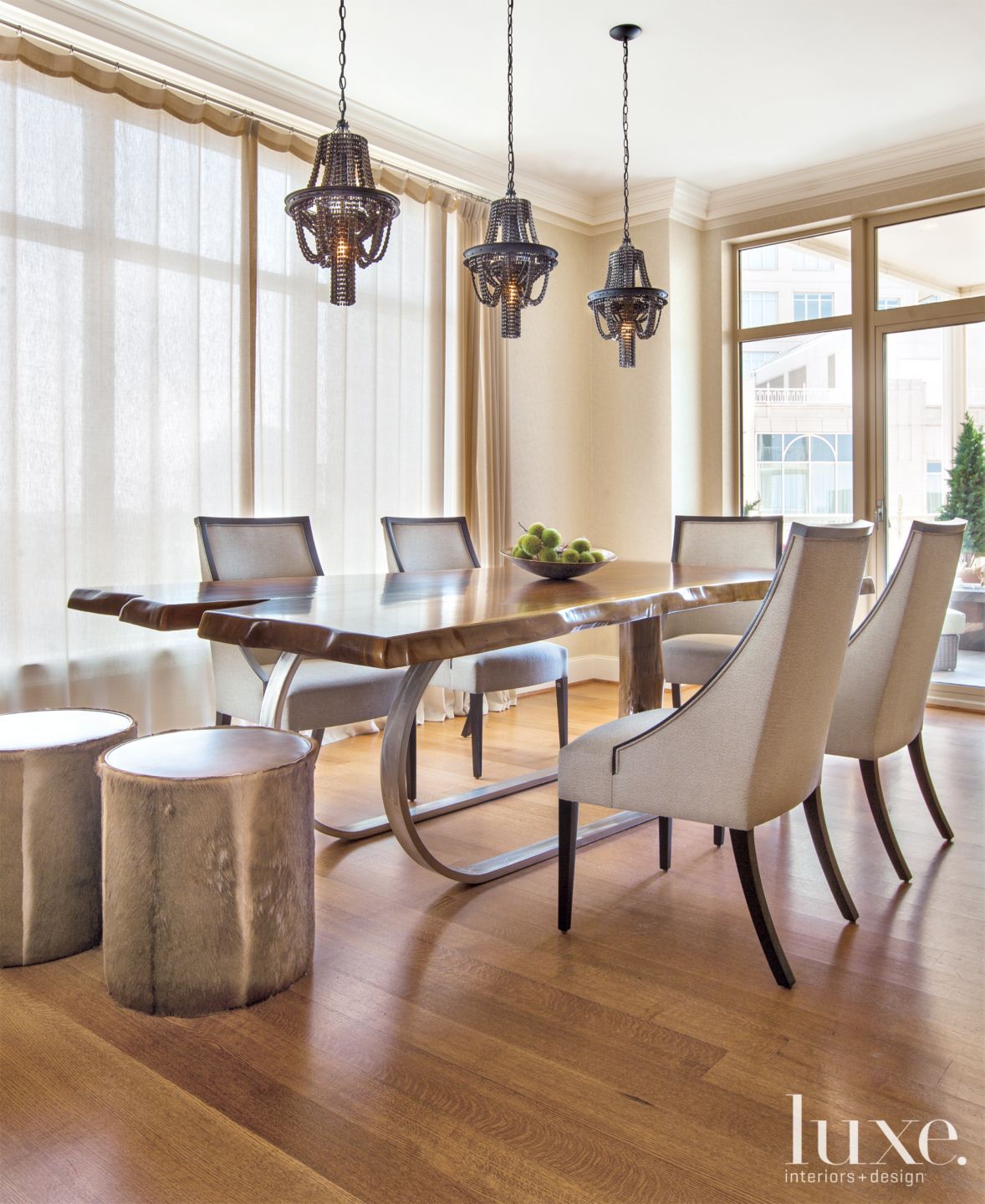 Modern Neutral Dining Room with Bicycle Part Pendants - Luxe Interiors + Design