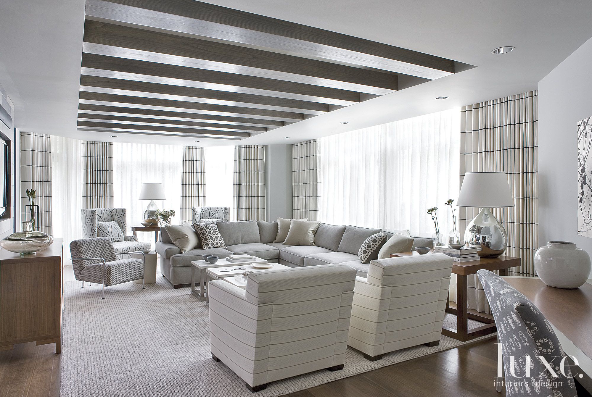 Contemporary Gray Living Room with Striped Decor - Luxe Interiors + Design