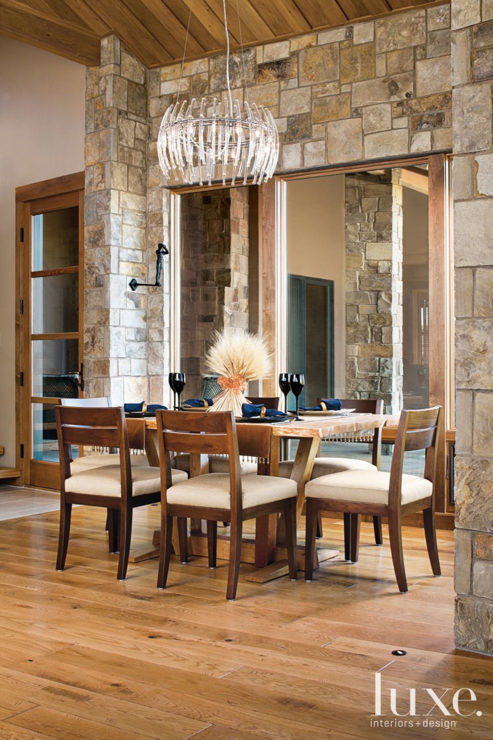 Stone-Clad Dining Room - Luxe Interiors + Design