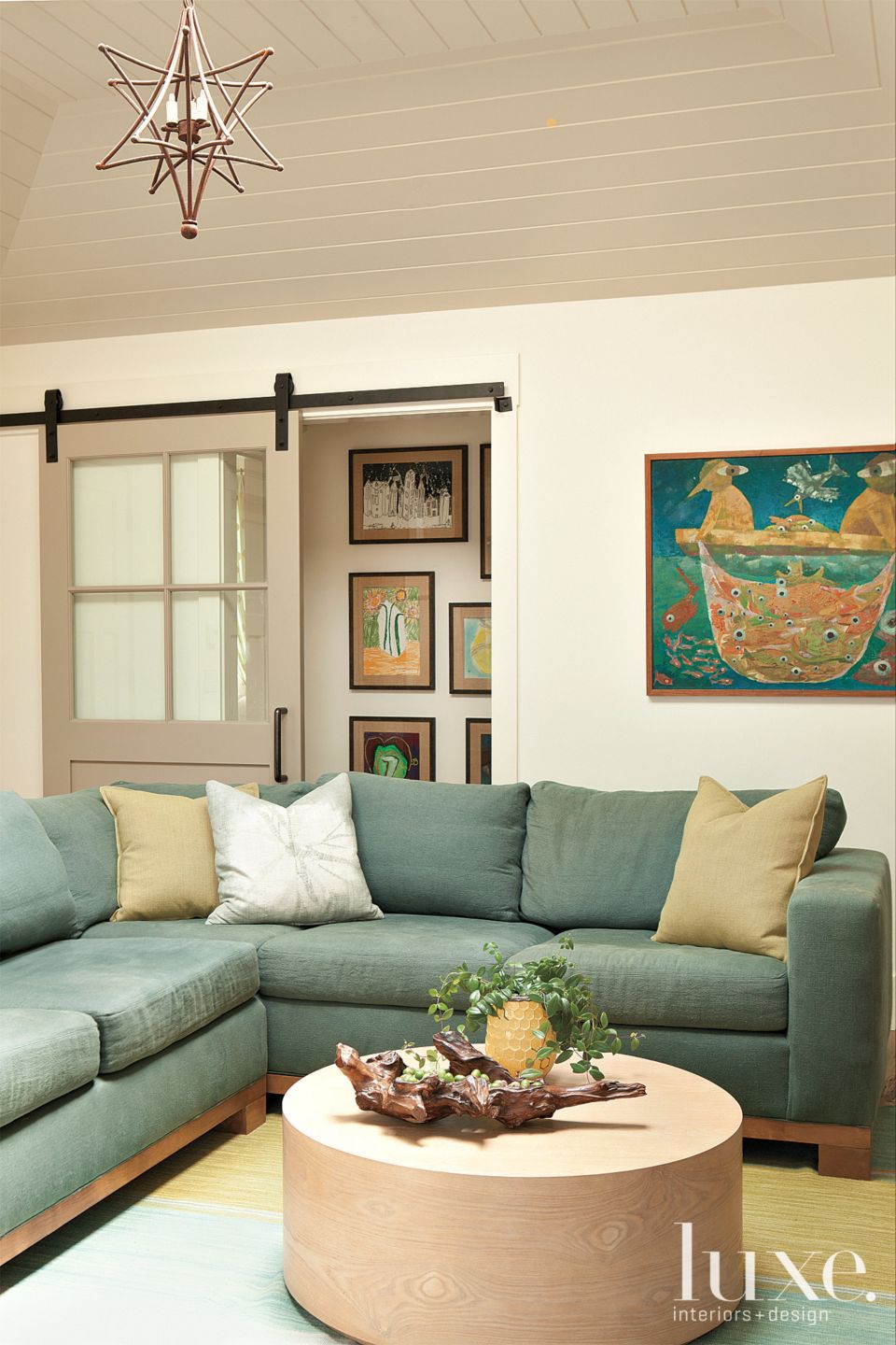 Neutral Contemporary Den with Blue and Green Sofa Luxe Interiors + Design