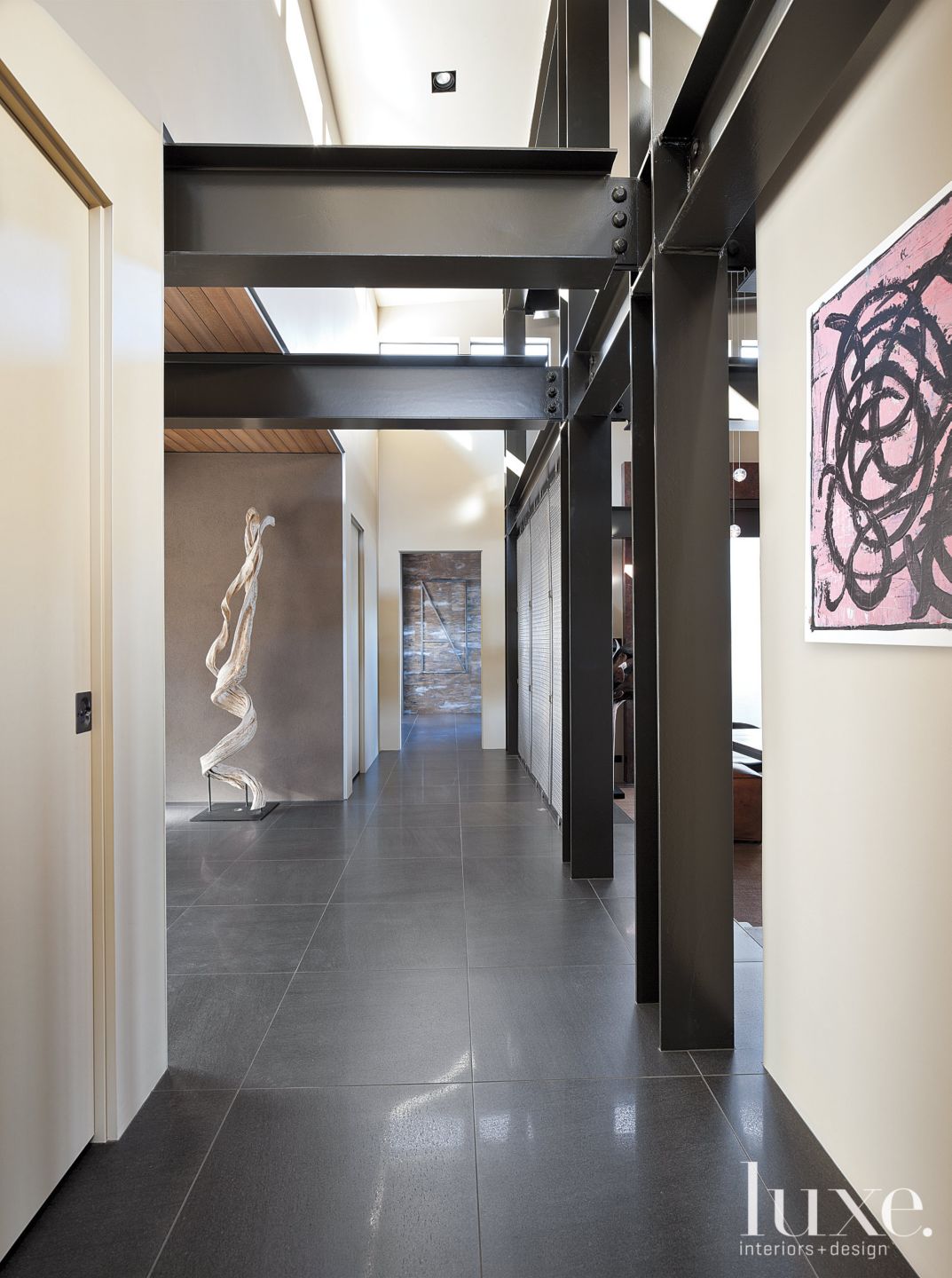Modern Cream Entry with Exposed Steel I-Beams - Luxe Interiors + Design