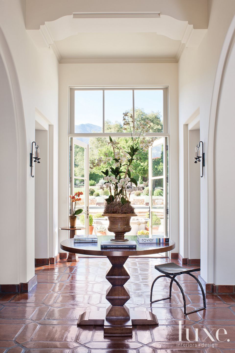 White Mediterranean Foyer Luxe Interiors + Design