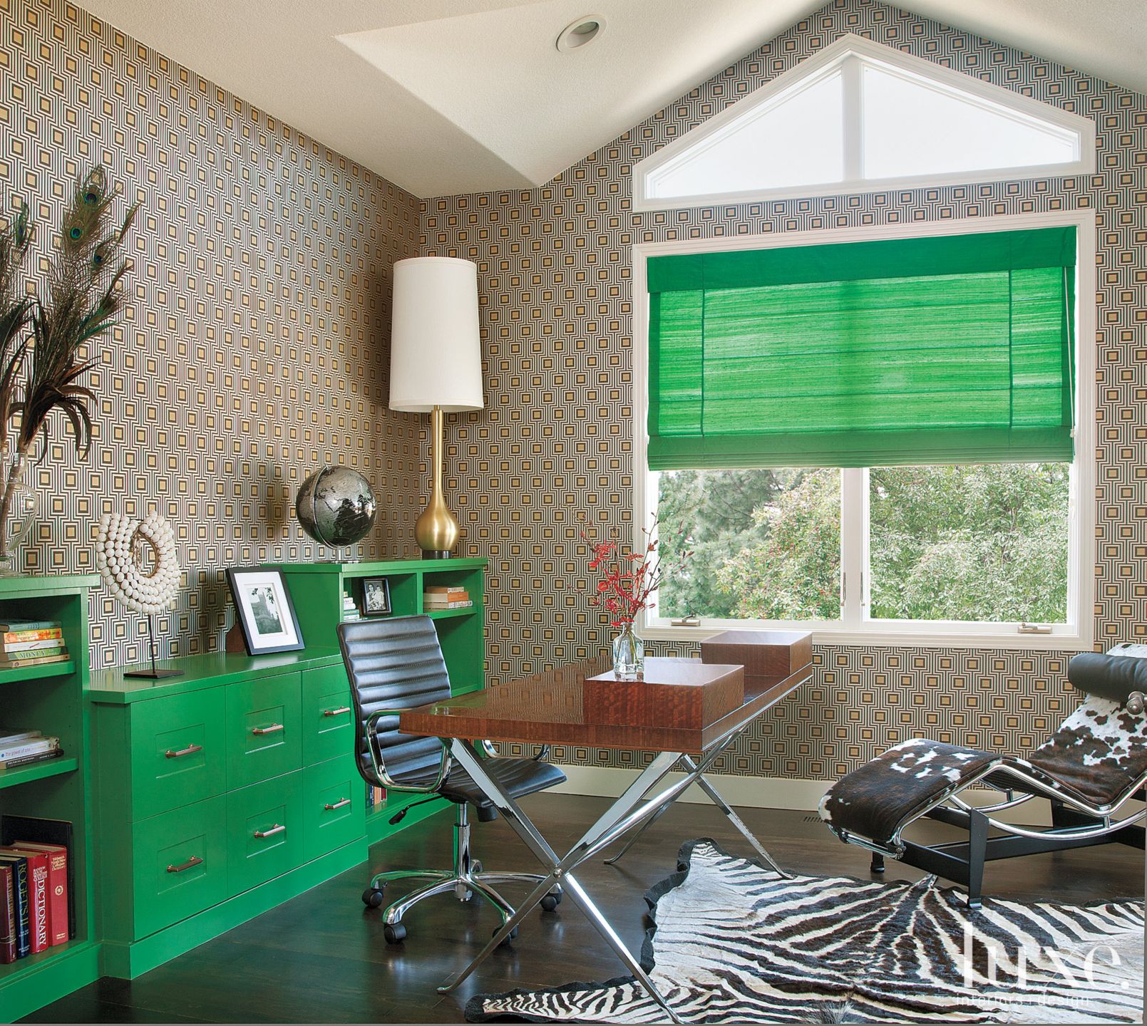 Office with green furnishings Luxe Interiors + Design