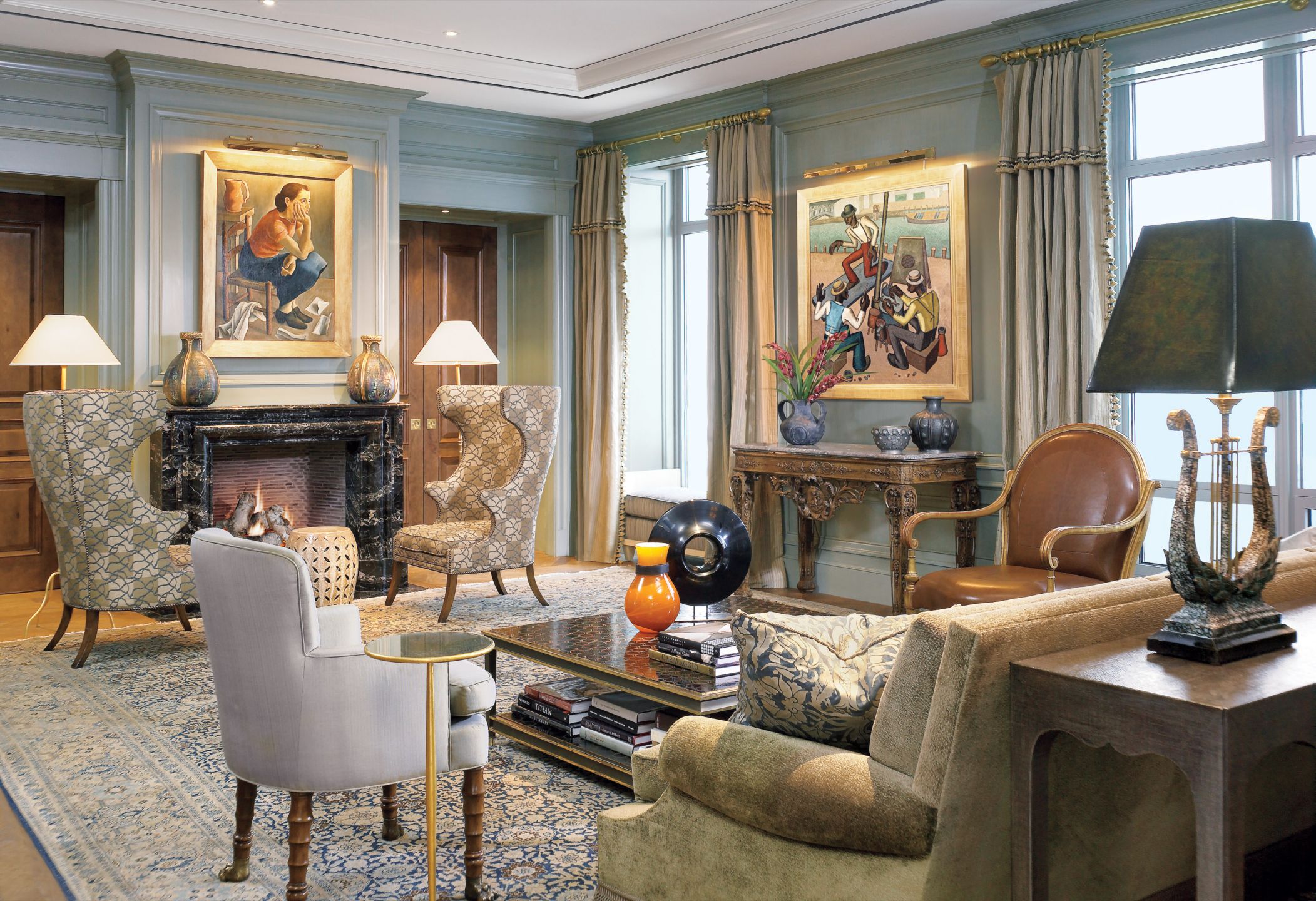Traditional Blue Living Room with French Artwork - Luxe Interiors + Design