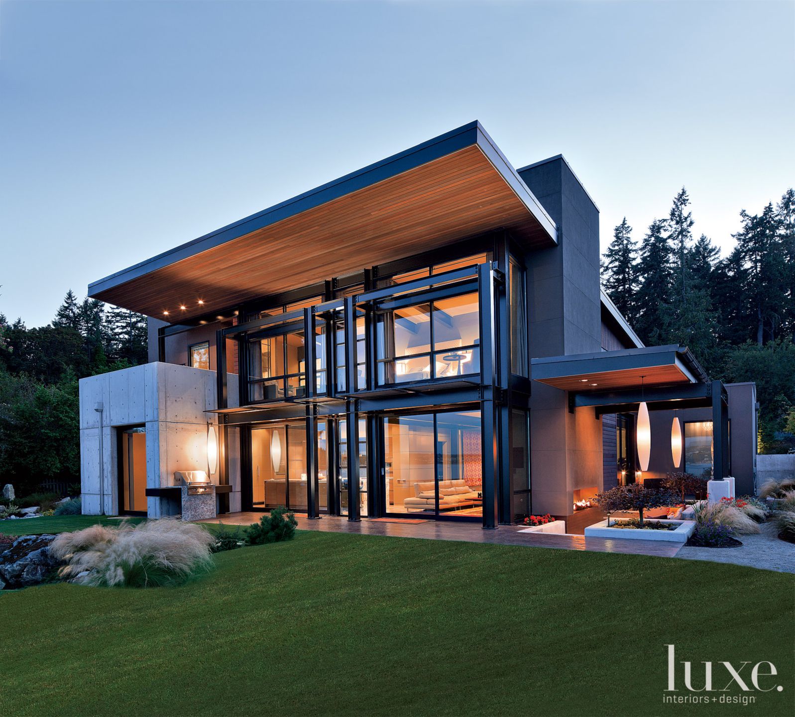 Modern Gray Exterior With Steel Beams - Luxe Interiors + Design