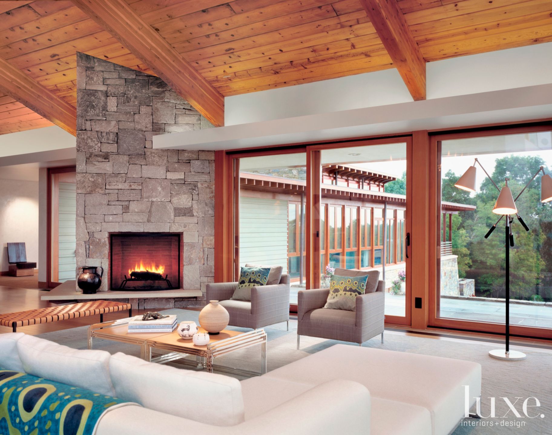 A Living Room With Hearthside Seating - Luxe Interiors + Design