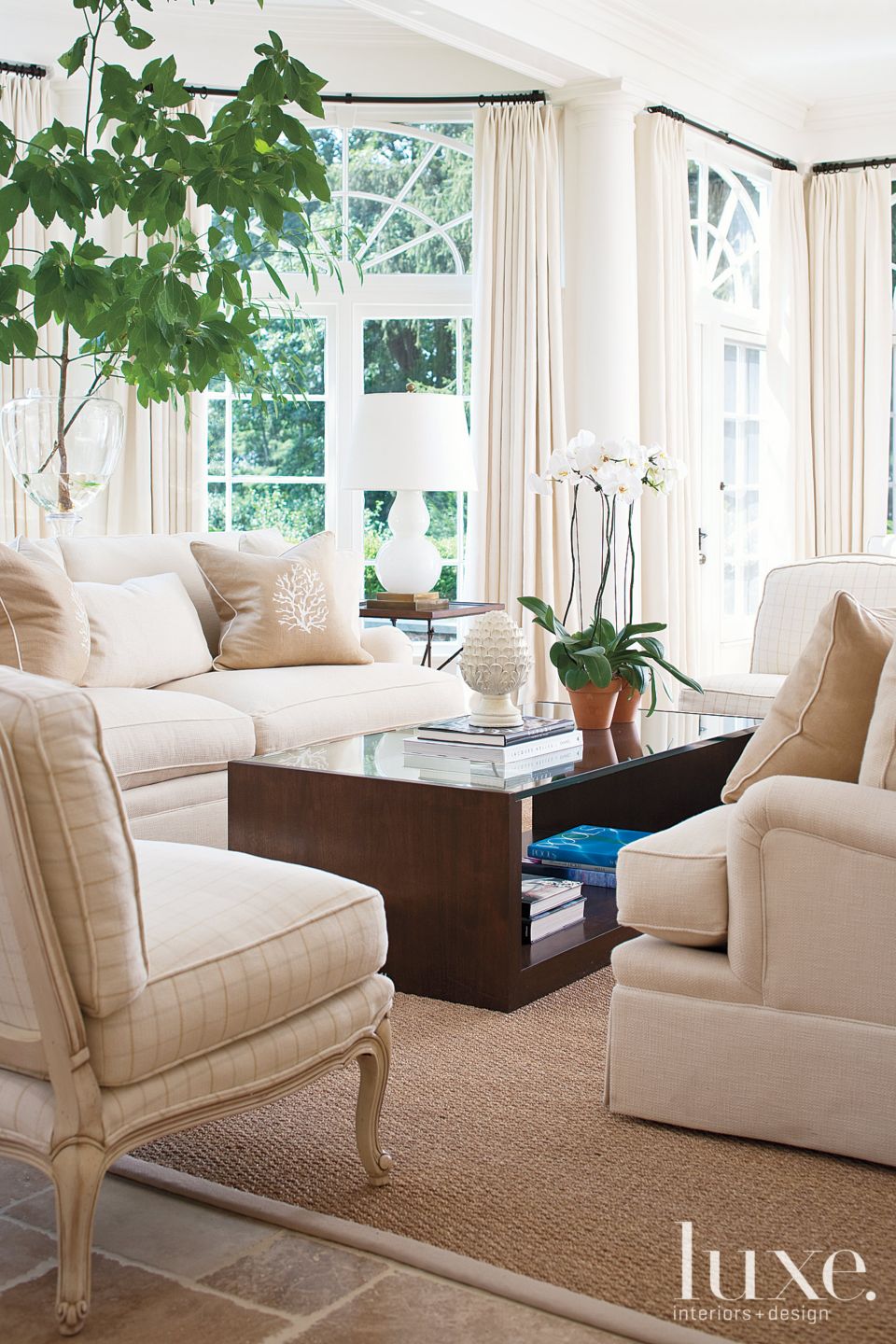 White Sunroom with Sea Grass Carpet Luxe Interiors + Design