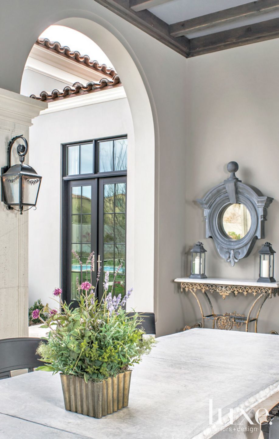 Gray Mediterranean Outdoor Dining Area Luxe Interiors + Design