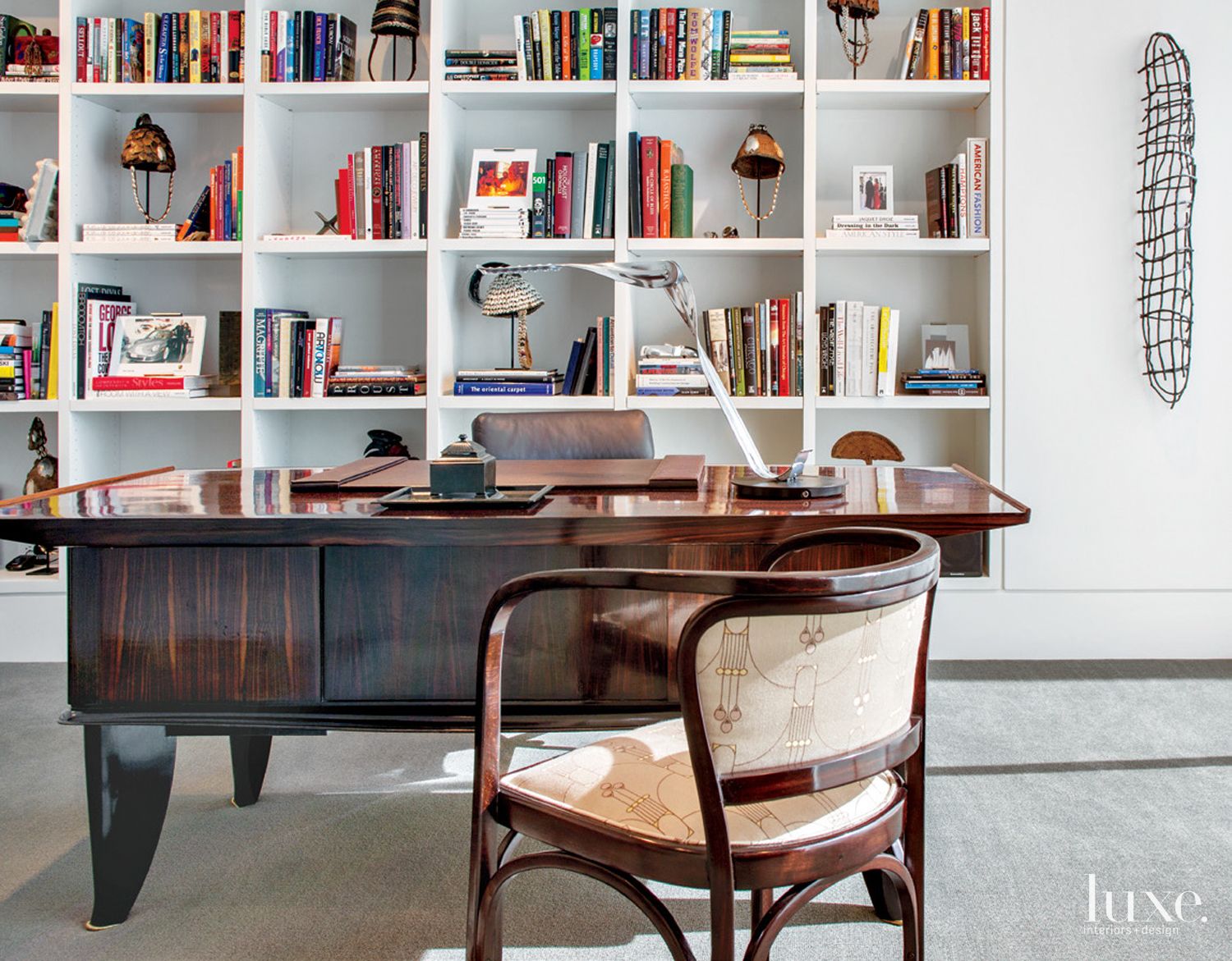 Contemporary White Library with Art Deco Desk - Luxe Interiors + Design