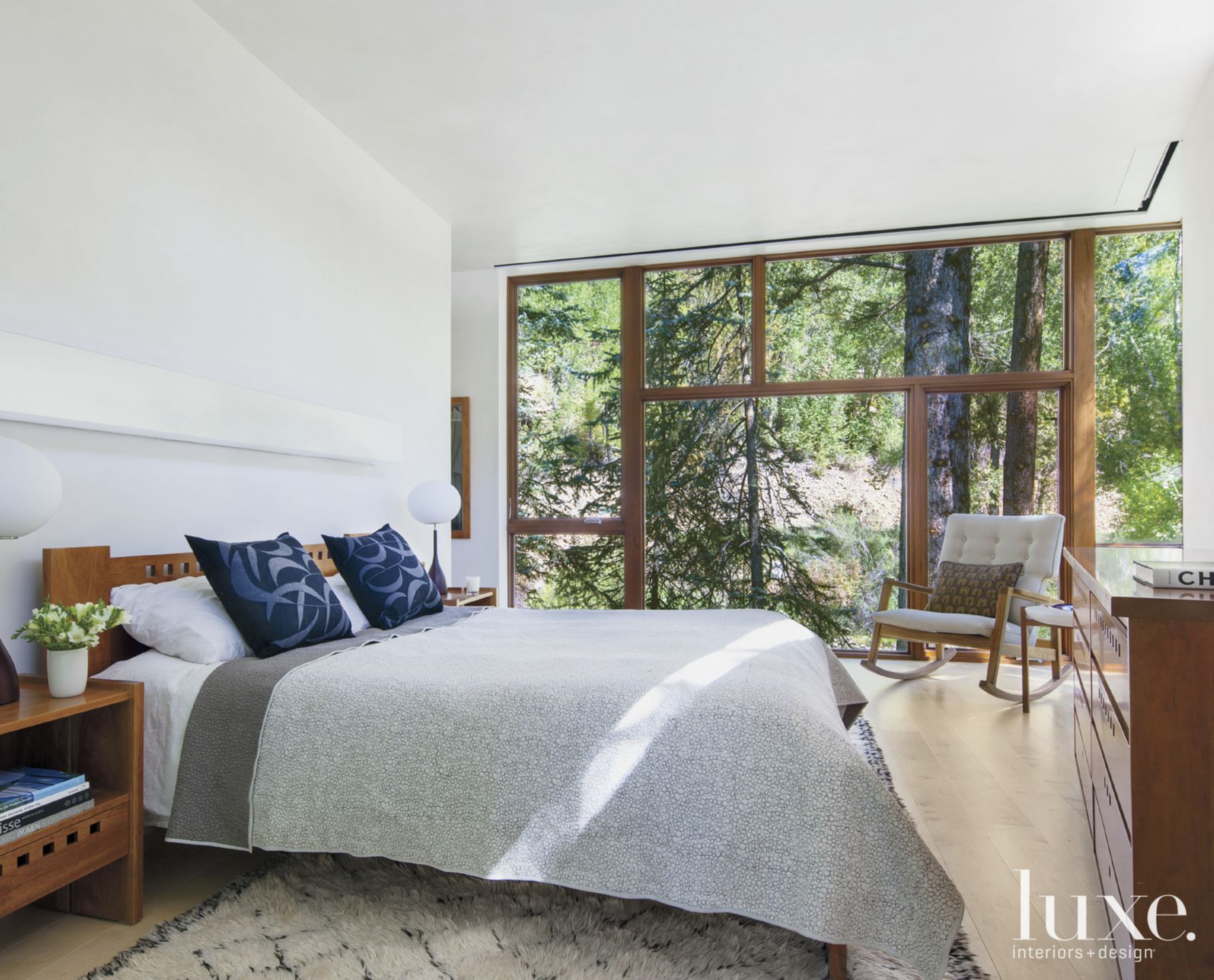 Contemporary White Bedroom with Rocking Chair Luxe Interiors + Design
