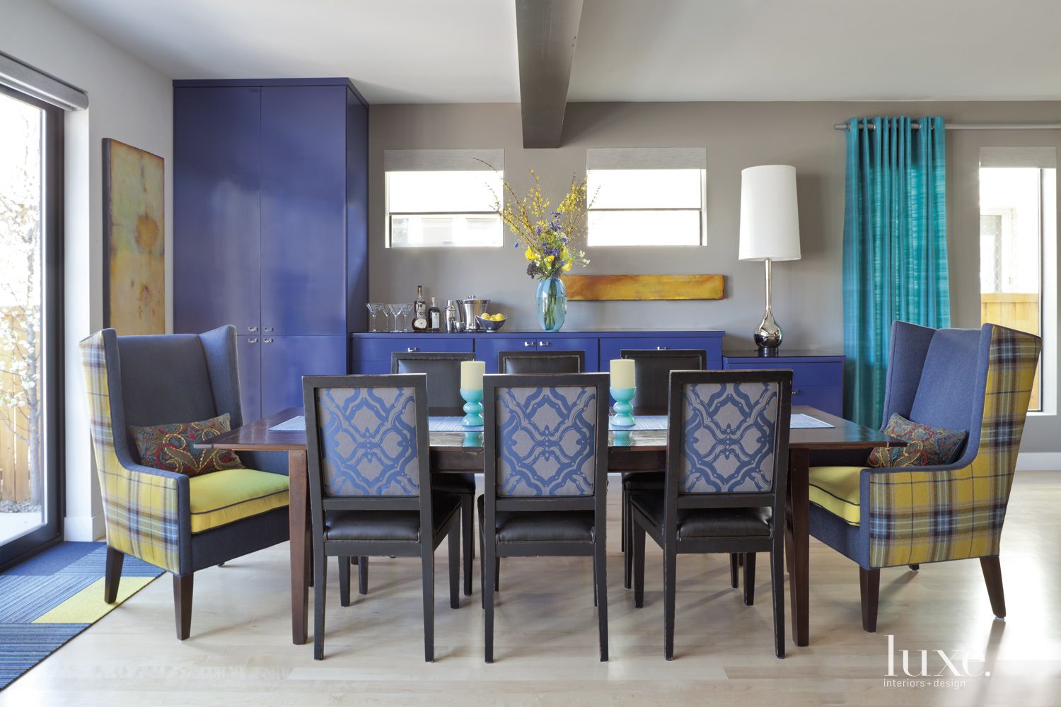 Contemporary Gray Dining Room with Blue Bar Area - Luxe Interiors + Design