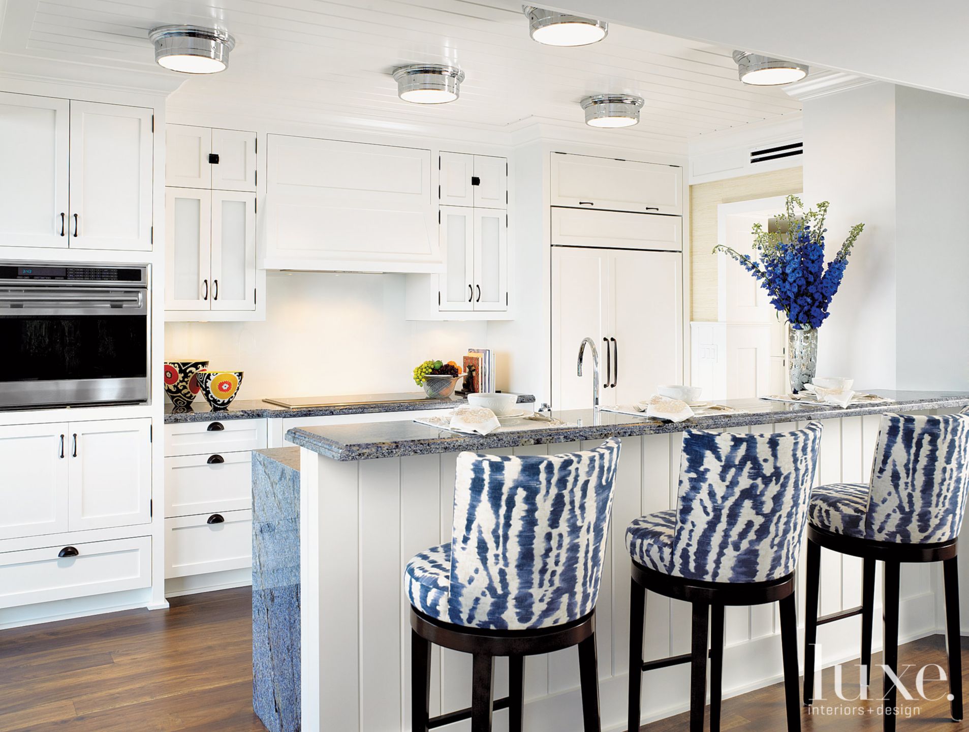 Contemporary White Kitchen with Linen Barstools Luxe Interiors + Design