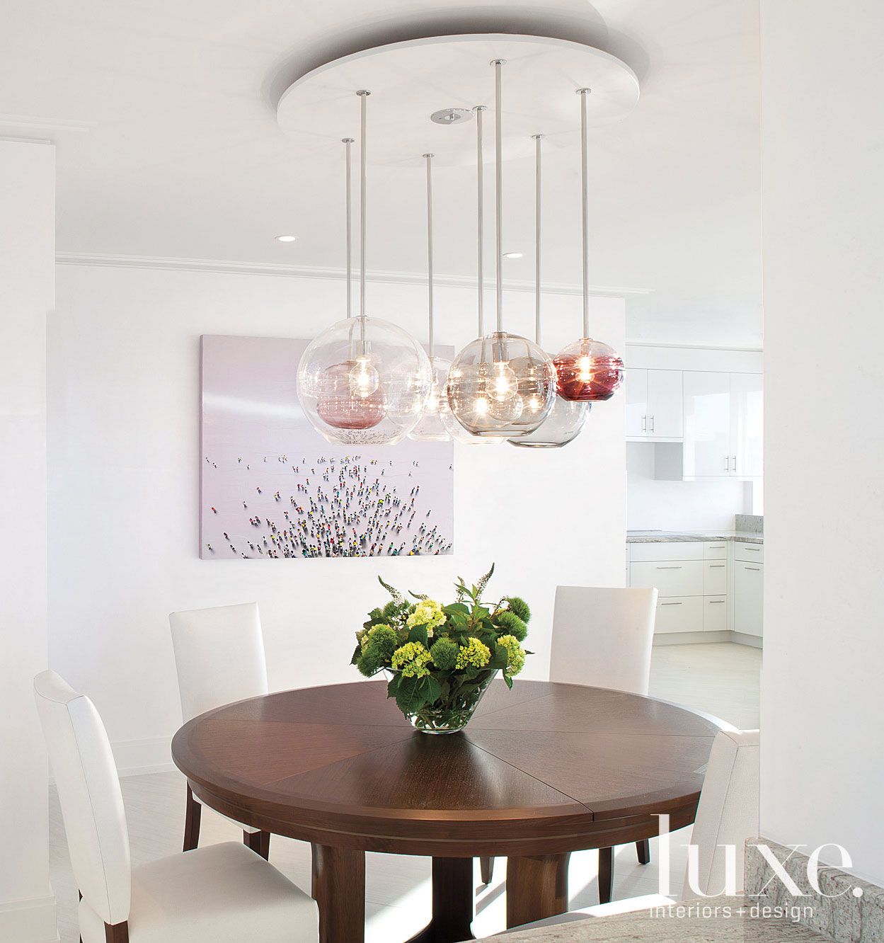 Contemporary White Dining Room with Bubble Light Fixture Luxe