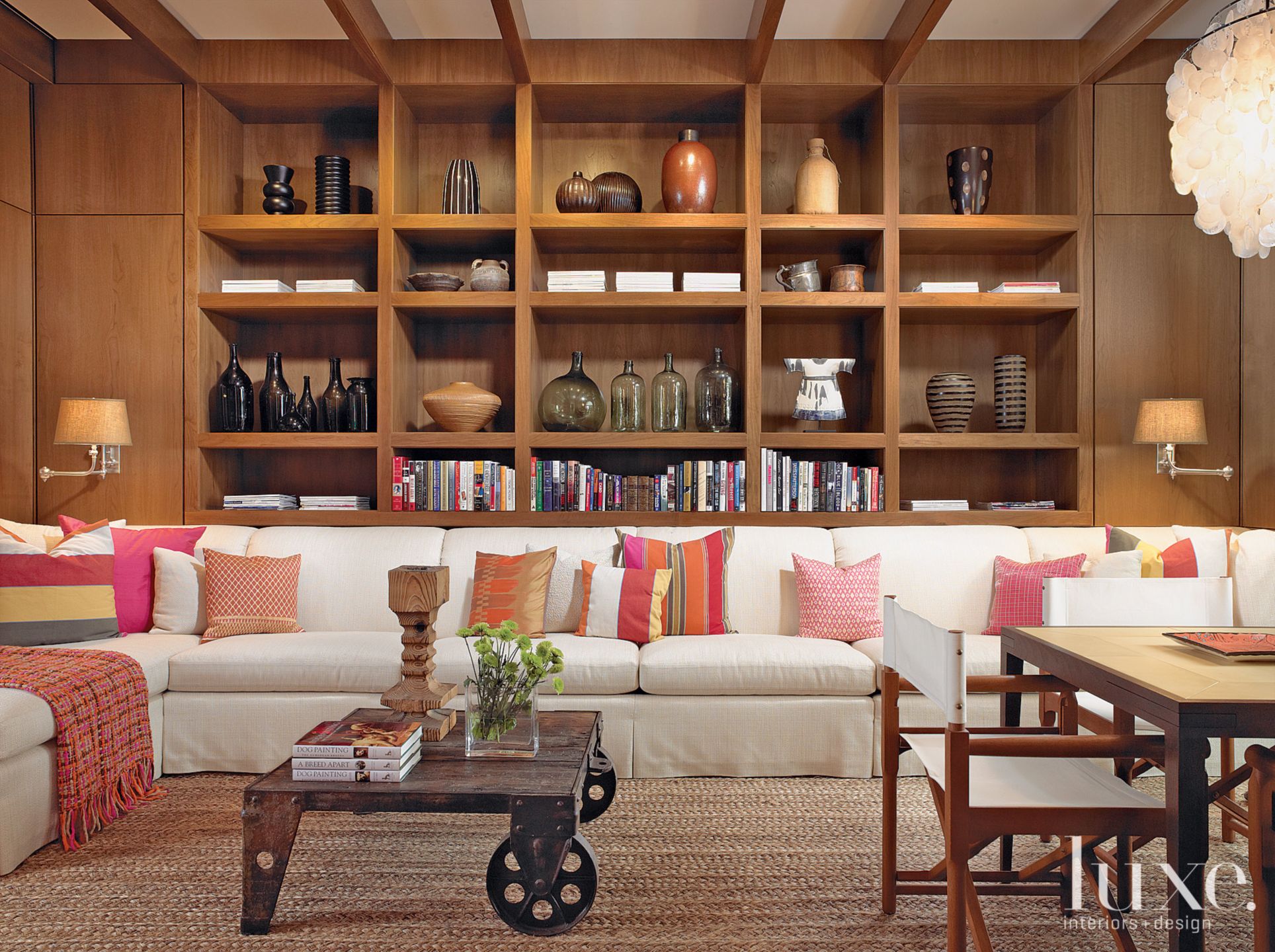 Contemporary Neutral Library with Walnut Paneling - Luxe Interiors + Design