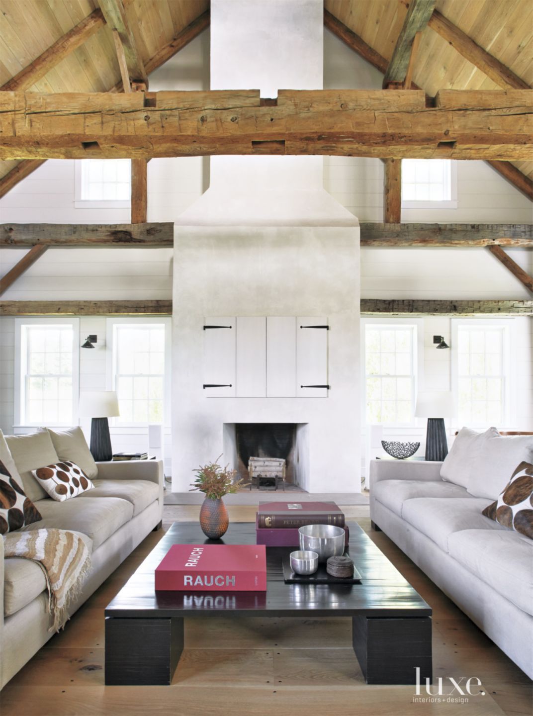 Country White Living Room with Exposed Beams - Luxe Interiors + Design