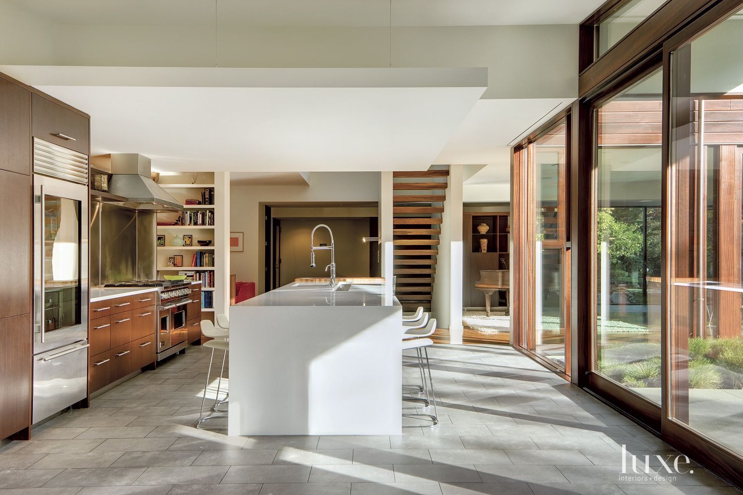 Modern White Kitchen with Large Island - Luxe Interiors + Design