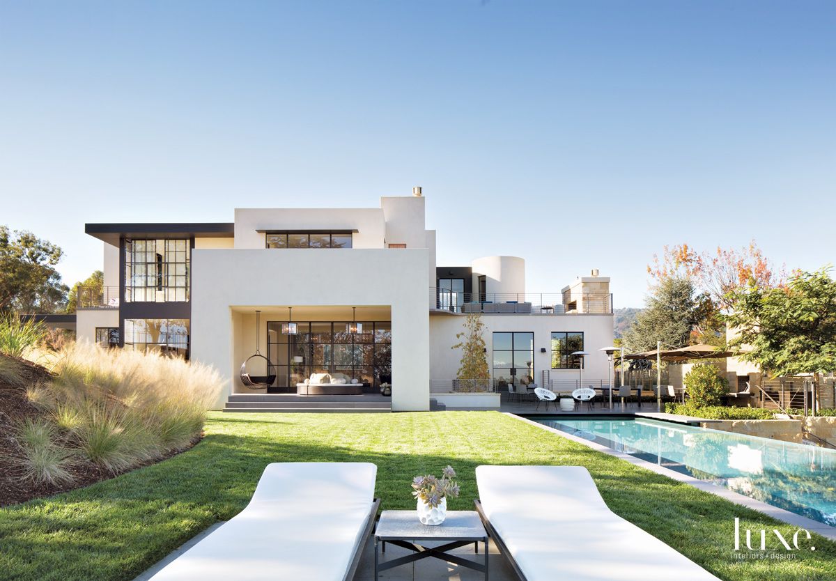 Modern White Rear Elevation with Flat Roof Luxe Interiors + Design