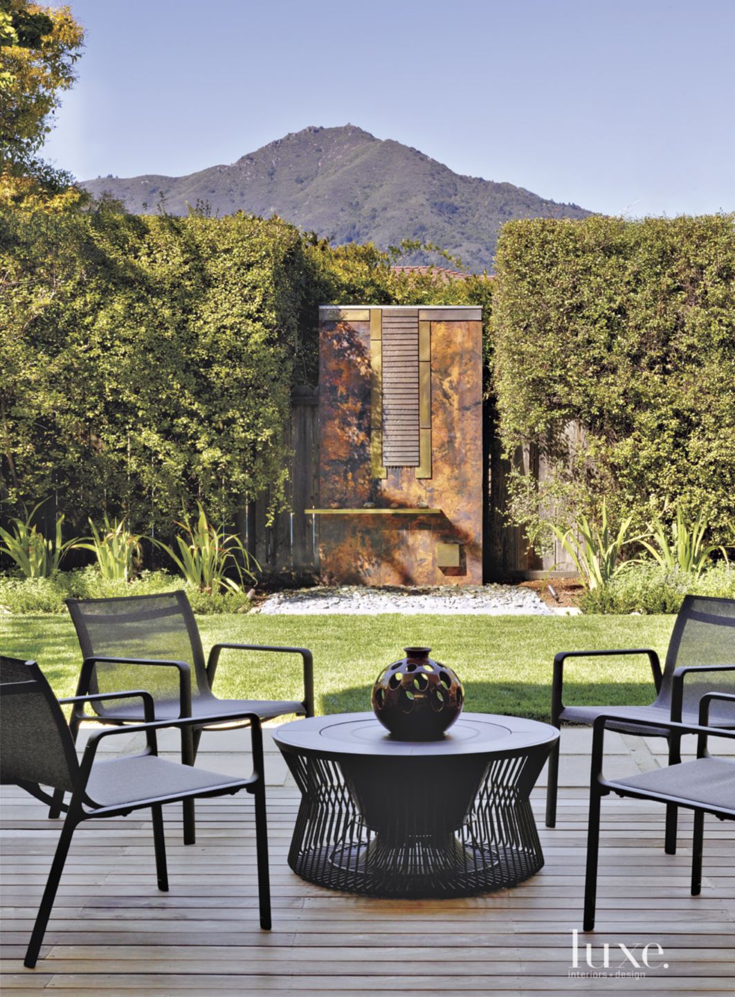 Contemporary Outdoor Seating Area - Luxe Interiors + Design