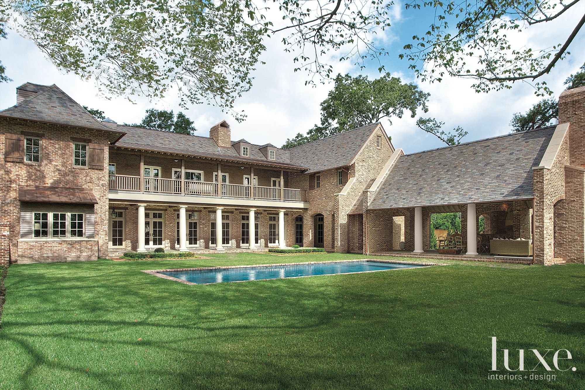 Traditional Brick Rear Elevation with In-Ground Pool - Luxe Interiors ...