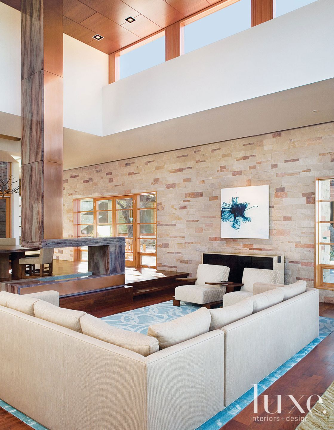 Modern Living Room with Limestone Wall Luxe Interiors + Design