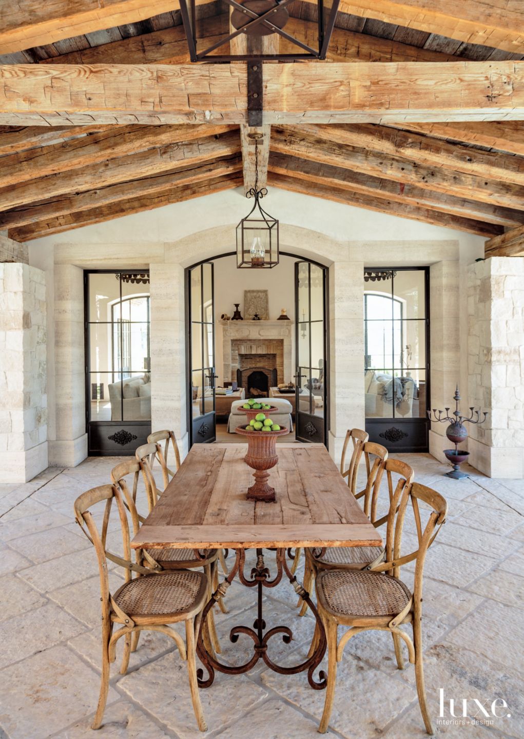 Traditional Neutral Covered Outdoor Dining Room with Exposed Wood Beams