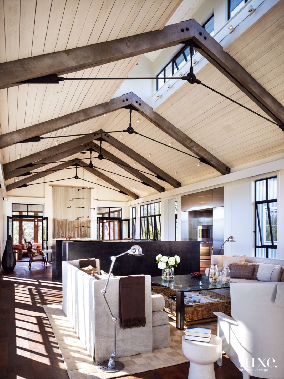 Modern Neutral Living Room with High-Back Sofas - Luxe Interiors + Design