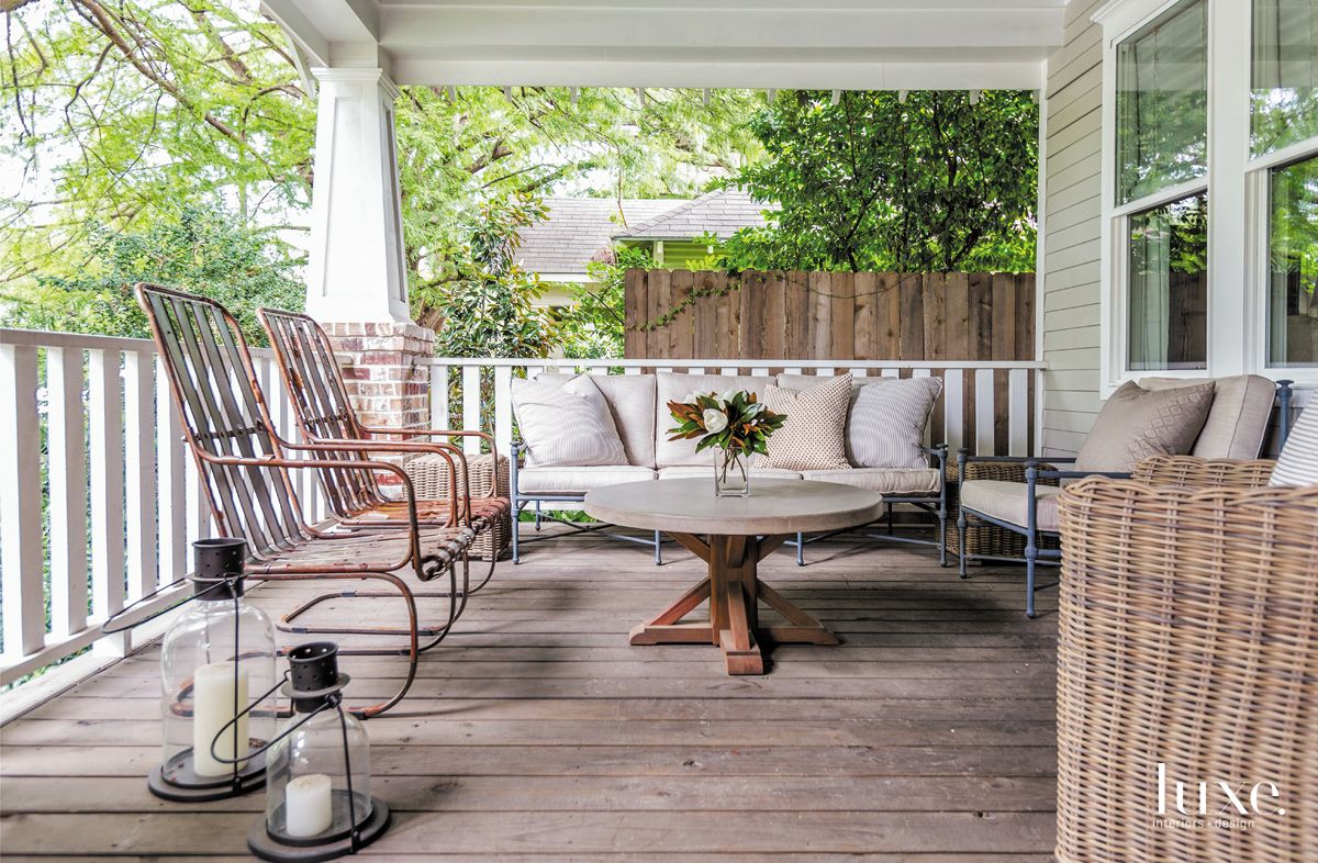 Traditional White Front Porch with Rustic Metal Chairs - Luxe Interiors ...