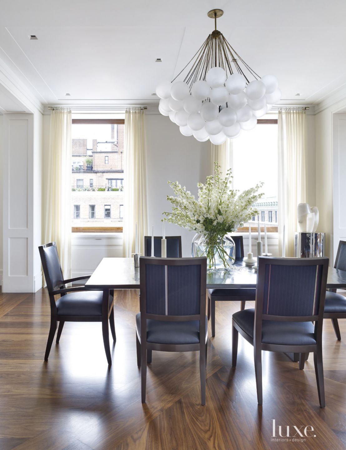 Modern Neutral Dining Room with Cloud Chandelier - Luxe Interiors + Design