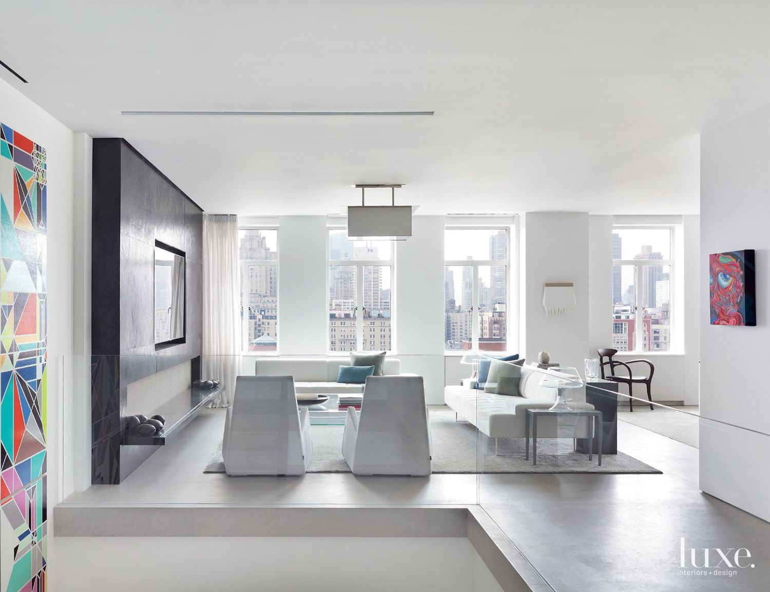 Modern White Living Room with City Views - Luxe Interiors + Design