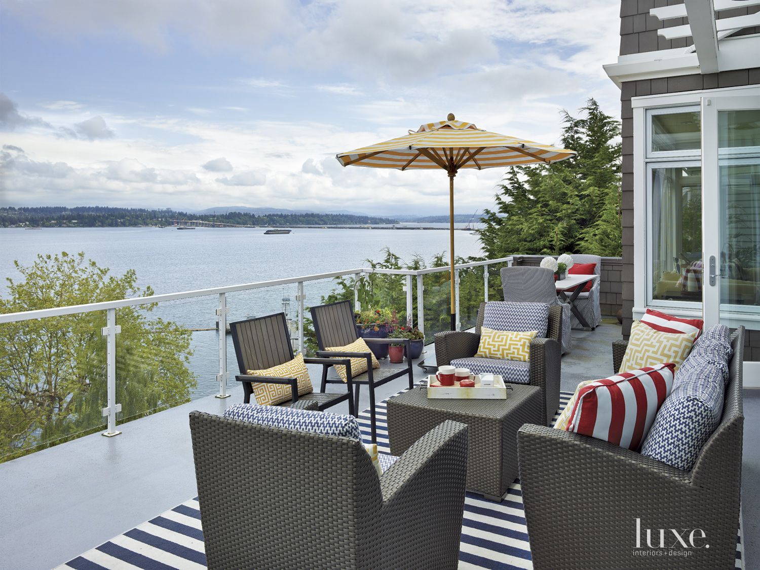 Contemporary Lakeside Deck with Mixed Patterns - Luxe Interiors + Design