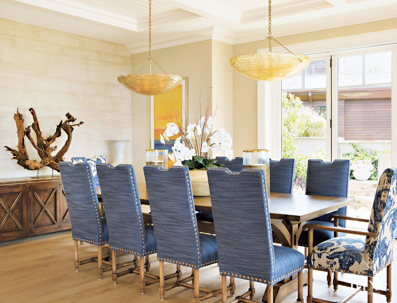 Cream Contemporary Dining Room with Millwork Luxe Interiors + Design